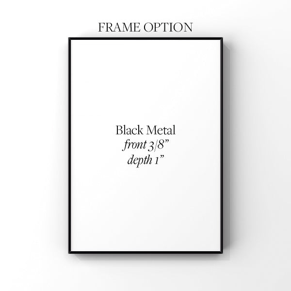 a black metal frame on a white wall